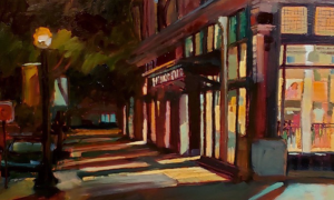A night time scene in a downtown setting